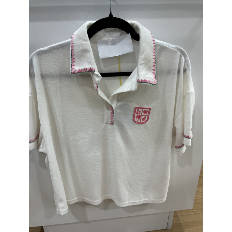 Polo éponge blanc et surpiqûres rose