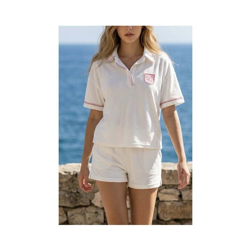 Polo éponge blanc et surpiqûres rose